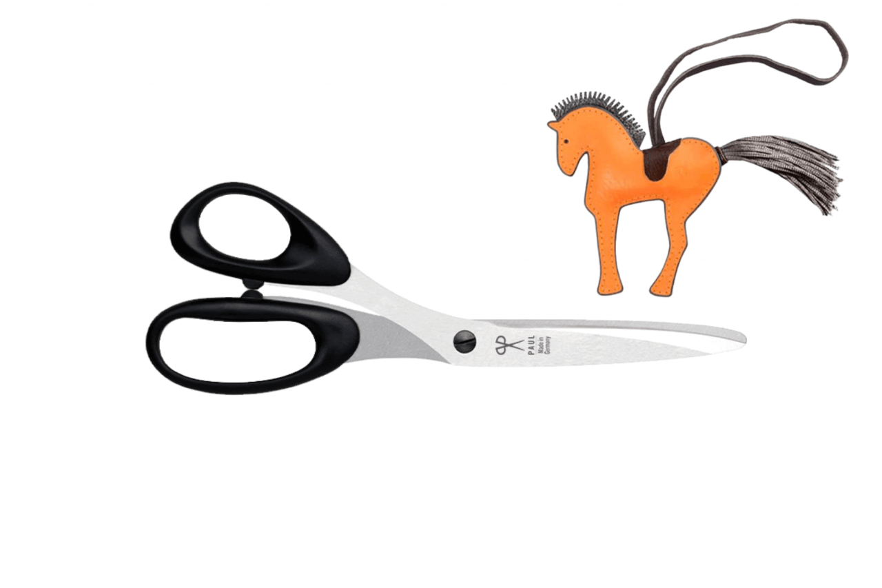 Left-handed tail scissors with hand-sewed horse tag made of leather
